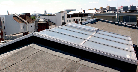 Raised glass roof on both sides